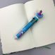 Багатобарвна ручка з іграшкою